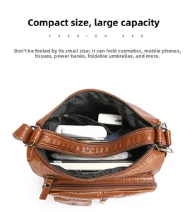 Sac à bandoulière en cuir souple marron avec plusieurs poches zippées et grande capacité