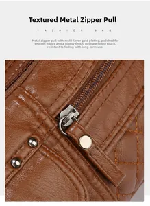 Détail de la fermeture éclair dorée sur le sac en similicuir marron avec matelassage