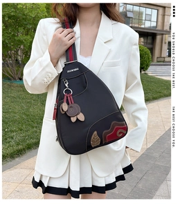 Waterproof nylon chest bag with decorative rabbit pendant and stylish woven strap