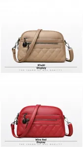 Detail of khaki and wine red pebble leather bags with quilted bottom and multi-zippers