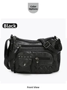 Détail frontal du sac bandoulière noir en similicuir avec fermetures éclair et matelassage