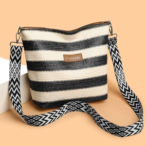Large woven tote bag with black and white stripes and patterned shoulder strap