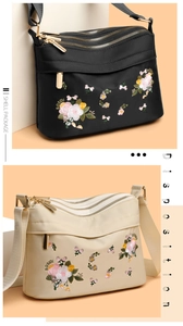 Detail of floral embroidery and three layered zipper compartments on nylon crossbody bags