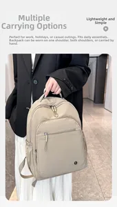 Detailed view of beige lightweight nylon backpack with multiple compartments for versatile carrying