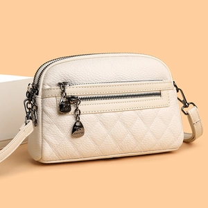 Quilted crossbody bag for women in cream PU leather with double zipper and chain details