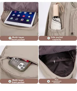 Detail view of khaki travel backpack with multi-layer front pockets and spacious main interior