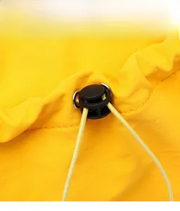 Detail showing high-quality drawstring adjustment with black plastic spring toggle on yellow bag