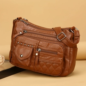 Sac Bandoulière Rétro Femme En Cuir PU Souple Multi Poches Grande Capacité Sac À Épaule Matelassé Avec Rivets Mode Décontractée