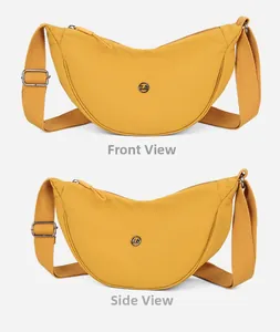 Vista frontale e laterale della borsa a tracolla in nylon giallo zenzero con cinturino