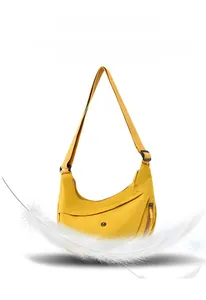Detail of lightweight yellow nylon crescent bag featuring smooth zippers and buckle