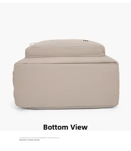 Flat bottom view of lightweight beige outdoor backpack showing durable base and material