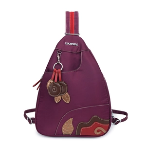 Waterproof purple nylon backpack for women with decorative patchwork and tassel