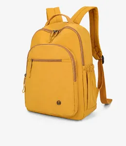Detailed side view of yellow lightweight backpack showing zippers and side pockets
