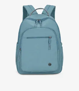 Front view of a Morandi blue lightweight backpack with a metal logo and zippers