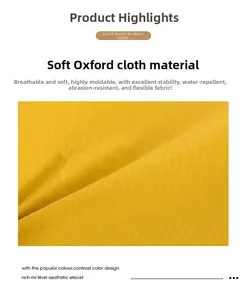 Detail of waterproof bright yellow Oxford fabric showing breathable and durable texture