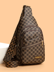 Close-up of monogram pattern and gold metal hardware on brown crossbody bag