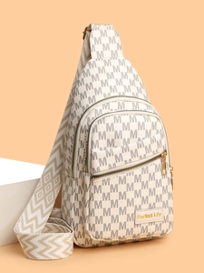Close-up of beige crossbody bag with M print and woven geometric strap details