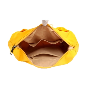 Large yellow canvas tote bag featuring multi-pocket interior for daily work and commuting
