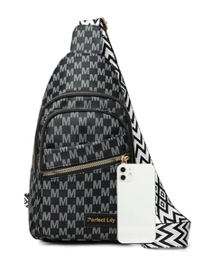 Detailed view of black crossbody bag with M-print pattern and smartphone for size scale