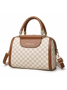 Detailed view of Boston bag with M-pattern monogram and adjustable leather strap