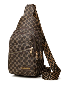 Detailed side view of the brown monogram crossbody bag with triple zippered compartments