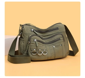 Army green nylon crossbody bag with multiple zip pockets and adjustable strap for women