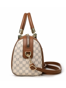 Macro shot of Boston bag details showing M-pattern print and brown leather trim