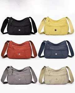 Multiple views of durable nylon crossbody bag in six colors with multi-pocket layout