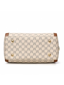 Detail of the handbag bottom with golden metal feet and premium monogram leather texture