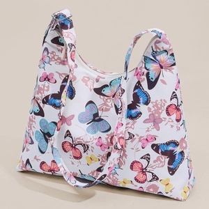 Minimalist white tote bag with colorful butterfly prints and adjustable wide shoulder strap