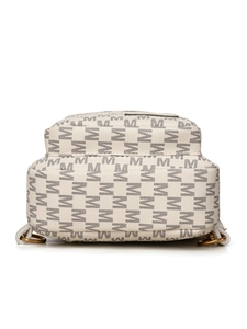 Close-up of monogram pattern on lightweight crossbody chest bag with golden metal hardware
