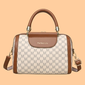 Classic Boston handbag with brown leather trim and gray monogram pattern print