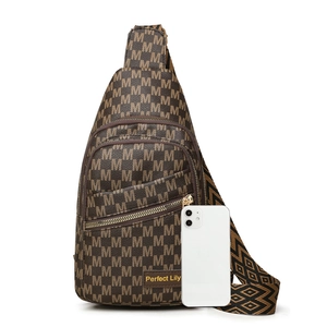 Brown monogram crossbody chest bag with gold logo and adjustable jacquard strap