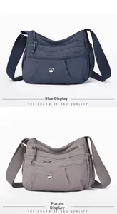 Vertical view of nylon crossbody bags in blue and purple with multi-zipper compartments
