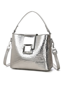 Macro detail of silver crocodile embossed leather bucket bag with square metal buckle