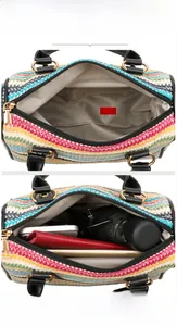 Internal view of colorful straw woven beach bag showing capacity for umbrella and phone