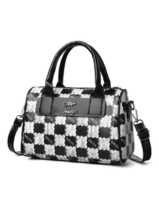 Detail view of checkerboard tote bag with dual handles and metal kangaroo logo