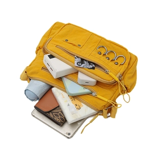 Yellow multi-pocket crossbody bag with large capacity for tablets and daily essentials