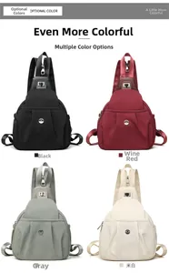 Detail of lightweight nylon chest bags in black, burgundy, grey, and off-white colors