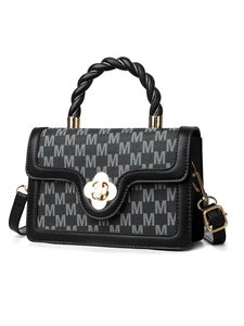 Detail of monogram M canvas bag with golden floral twist lock and woven handle