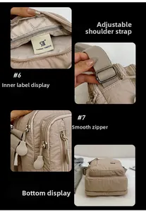 Detailed close-up of khaki nylon shoulder bag with adjustable strap and multiple zippers