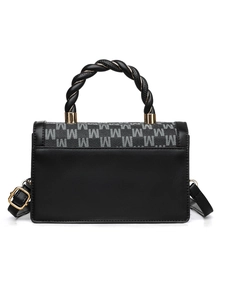 Close-up of black leather bag with M-letter jacquard and braided handle detail