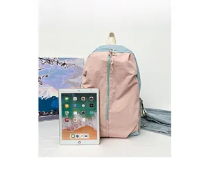 Detailed comparison of waterproof yoga backpack size with a tablet device