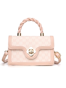 Close-up of beige crossbody bag with M-pattern texture and gold flower clasp lock