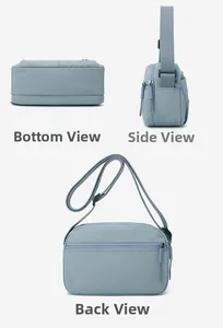 Detailed views of the lightweight puff crossbody bag with zippers and adjustable strap
