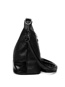 Detail view of stylish Boston bag showing ostrich texture and smooth patent leather