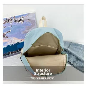 Detail view of the waterproof yoga backpack showing the internal compartment and blue nylon