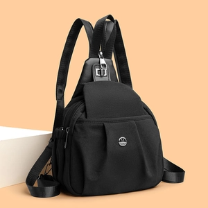 Versatile black waterproof nylon crossbody chest bag with adjustable strap and multi-zipper pockets