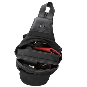 Lightweight black multi-compartment travel chest bag showing large capacity storage