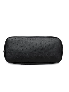 Detailed bottom view of black Boston bag with ostrich leather texture and PU material